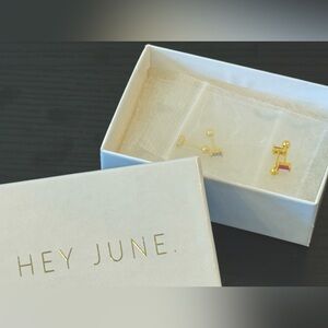 Two pairs of Hey June screw back earrings.